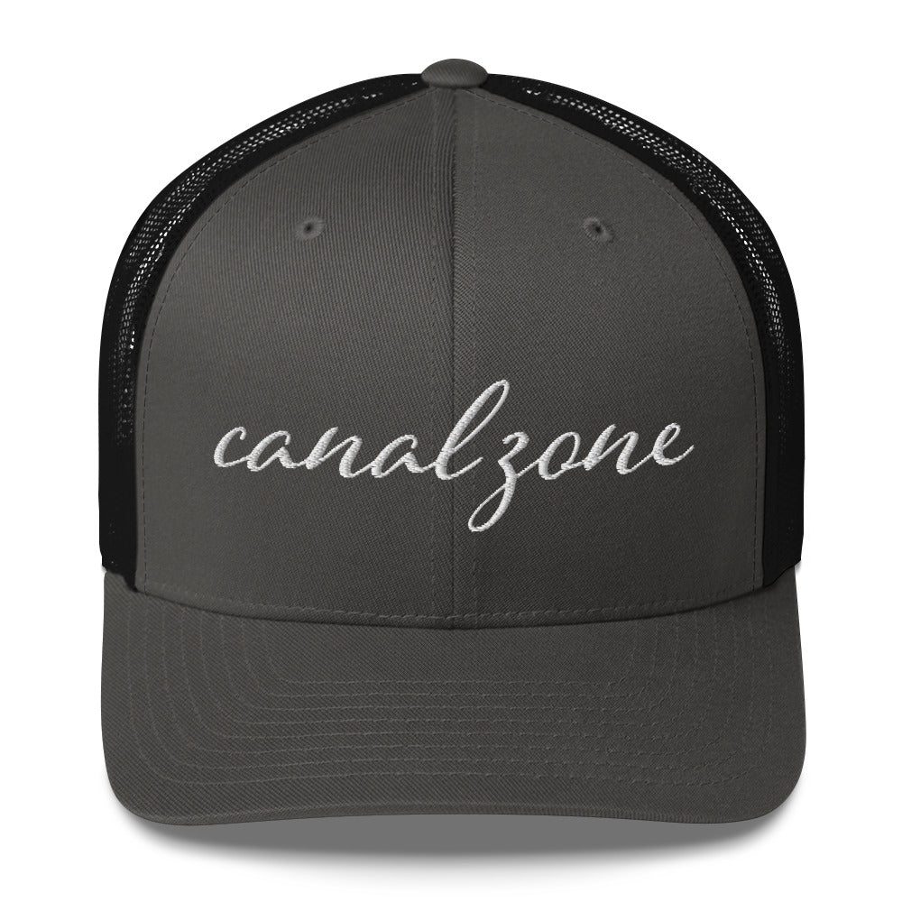 Canal Zone (script), Trucker Cap