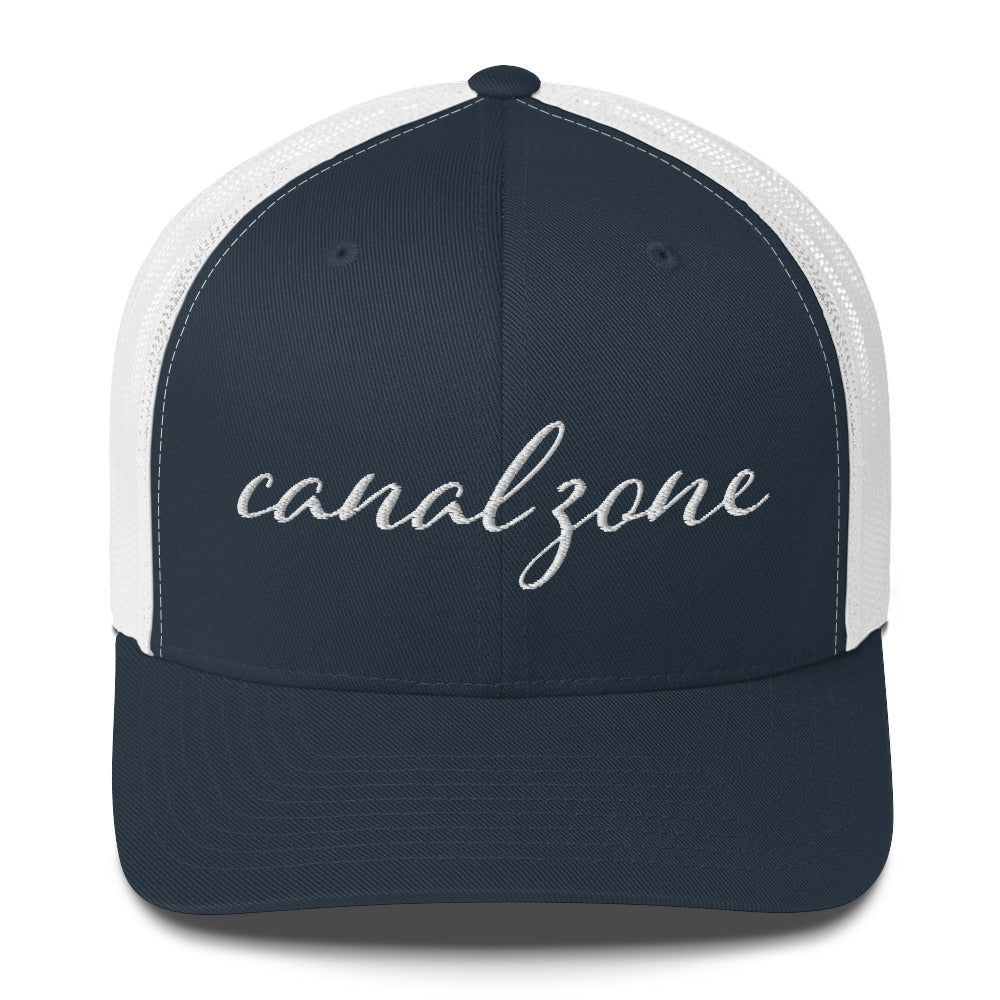 Canal Zone (script), Trucker Cap